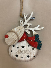 Load image into Gallery viewer, Wooden reindeer with scarf and saying
